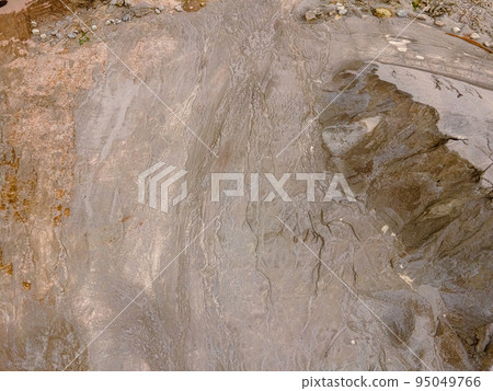 Summertime rock quarry after rain Summertime rock quarry after rain 95049766