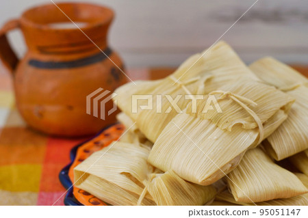 Mexican cuisine tamales and atole 95051147