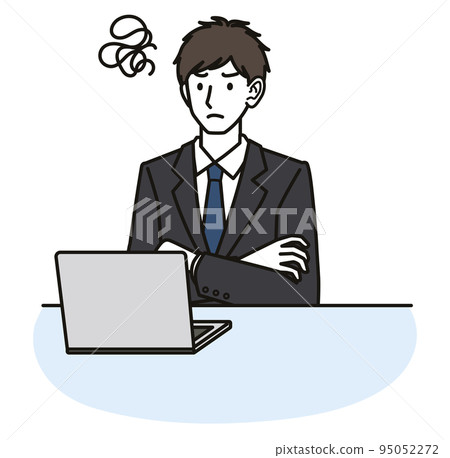 一個穿著西裝的男人對著電腦屏幕感到沮喪 95052272