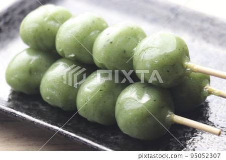Three skewers of grass dumplings Three skewers of grass dumplings 95052307
