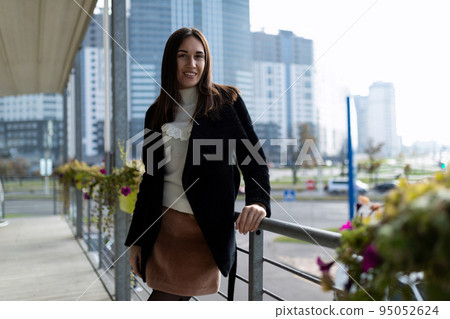 portrait of stylish modern woman in city cafe in early morning portrait of stylish modern woman in city cafe in early morning 95052624