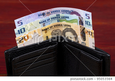 Sierra Leonean money in the black wallet 95053564