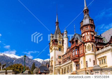 Peles castle tower and mountains, Sinaia, Romania Peles castle tower and mountains, Sinaia, Romania 95053894