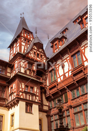 Peles castle tower and sunset sky, Sinaia, Romania Peles castle tower and sunset sky, Sinaia, Romania 95053896