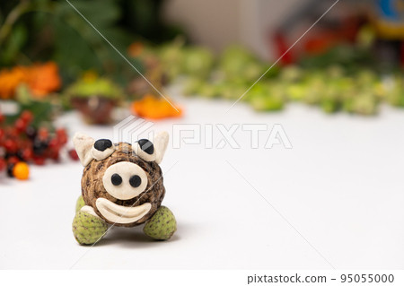 Pig figurine made of cone and plasticine, children's crafts, space for text Pig figurine made of cone and plasticine, children's crafts, space for text 95055000