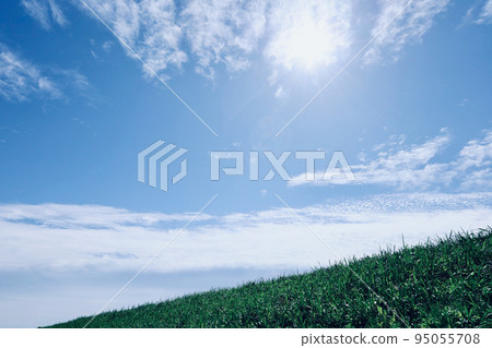 Hill and blue sky 95055708