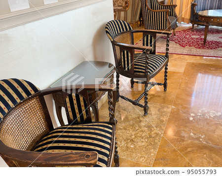 Fragments of vintage luxurious furniture in the Romanov style. Fragments of vintage luxurious furniture in the Romanov style. 95055793