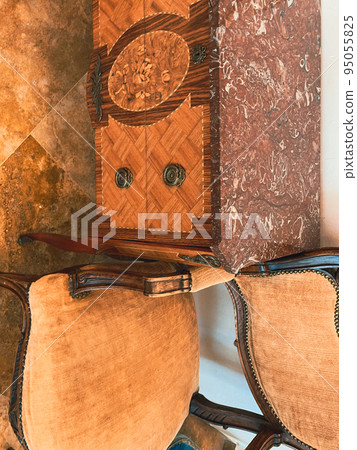 Fragments of vintage luxurious furniture in the Romanov style. Fragments of vintage luxurious furniture in the Romanov style. 95055825