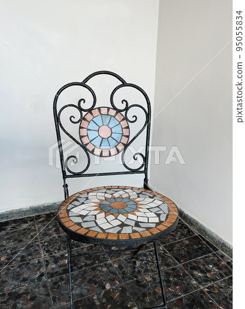 Antique furniture mosaic chair in vintage style. Antique furniture mosaic chair in vintage style. 95055834