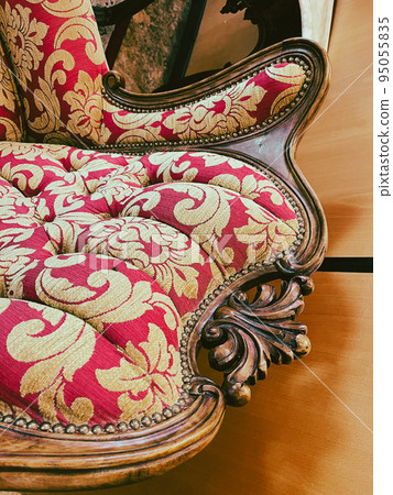Fragments of vintage luxurious furniture in the Romanov style. Fragments of vintage luxurious furniture in the Romanov style. 95055835