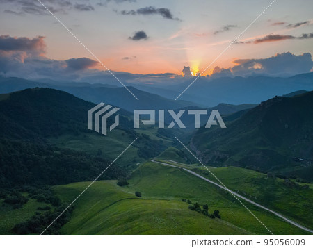 Scenic mountain sunrise landscape in mountains of Caucasus 95056009