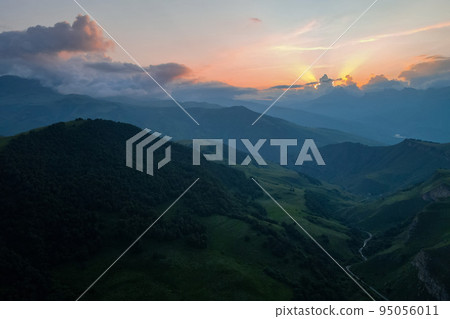 Scenic mountain sunrise landscape in mountains of Caucasus 95056011