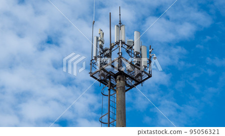 Modern tower 5 g on the background of a cloudy sky. Telecommunication antenna. Repeater. Communication tower. Estonia. 95056321