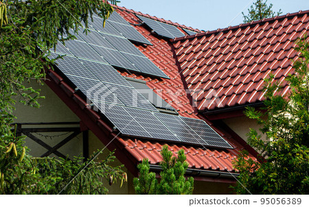 Historic farm house with modern solar panels Historic farm house with modern solar panels 95056389