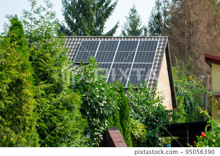 Historic farm house with modern solar panels Historic farm house with modern solar panels 95056390