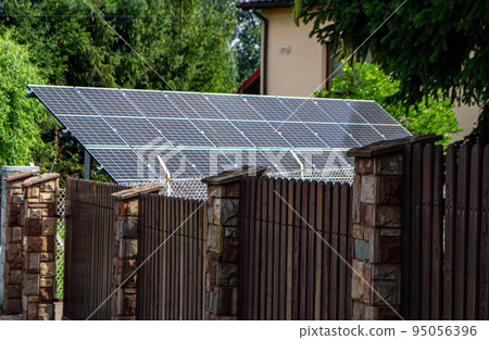 Historic farm house with modern solar panels Historic farm house with modern solar panels 95056396