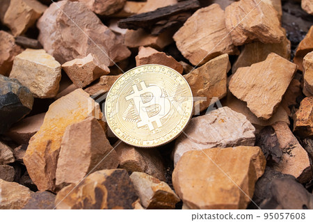 Bitcoin on the background of fragments of stones Bitcoin on the background of fragments of stones 95057608