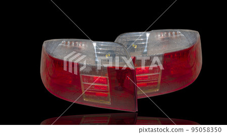 Car tail lights separate from white background. 95058350