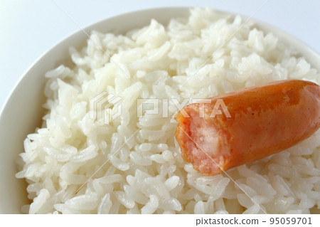 Cross section of sausage on rice Cross section of sausage on rice 95059701