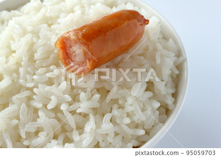 Cross section of sausage on rice Cross section of sausage on rice 95059703