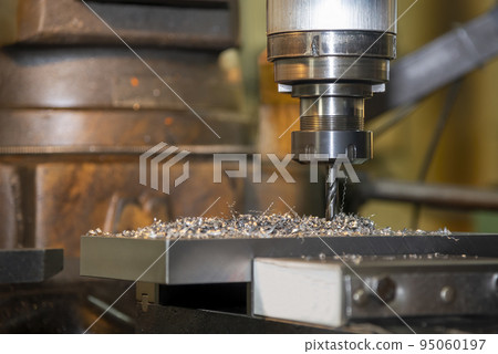 The drilling process on NC milling machine with coolant method. 95060197