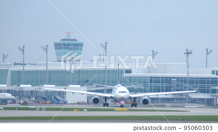 MUNICH, GERMANY - 11 OCTOBER 2015: Lufthansa Airbus A330-300 passenger plane taxiing at Munich Airport MUC 95060303