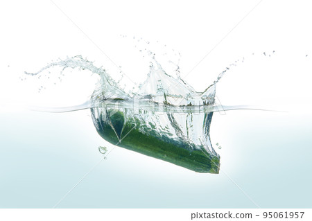 Zuchini splashing in water. Zuchini splashing in water. 95061957