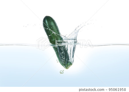 Zuchini splashing in water. Zuchini splashing in water. 95061958