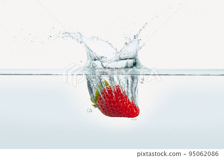 Strawberry splashing in water. Strawberry splashing in water. 95062086