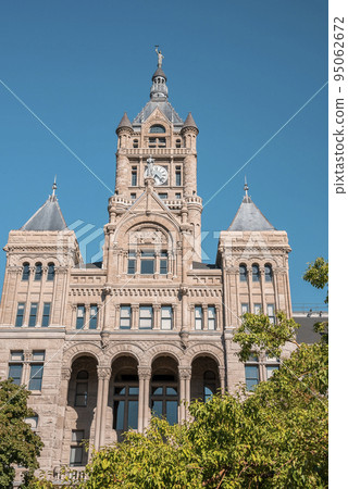 Low angle view of Salt Lake City and County Building. Facade of historic Government landmark with clear blue sky in background. Famous tourist attraction during sunny day. 95062672