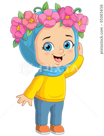 The young girl is wearing veil and showing the handmade flowers crown The young girl is wearing veil and showing the handmade flowers crown 95065656