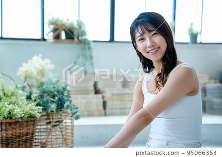 young woman relaxing 95066363