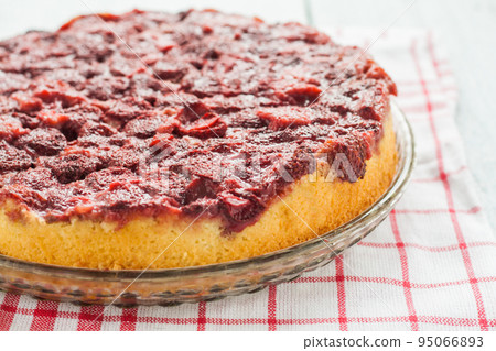 pie with fresh strawberries on a plate pie with fresh strawberries on a plate 95066893