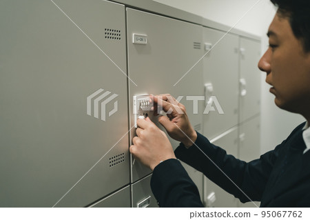 Office workers in lockers and suits Office workers in lockers and suits 95067762
