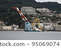 A crane ship moored in the bay 95069074