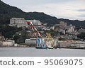 A crane ship moored in the bay 95069075