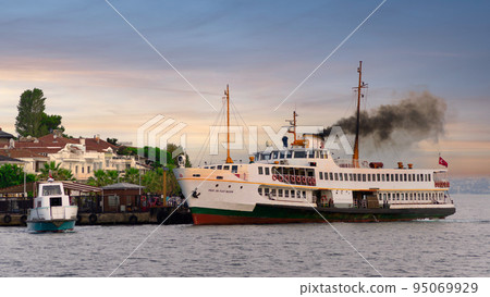 Modern ferry boat departing Kinaliada Island Terminal in Marmara sea at dawn, near Istanbul, Turkey Modern ferry boat departing Kinaliada Island Terminal in Marmara sea at dawn, near Istanbul, Turkey 95069929