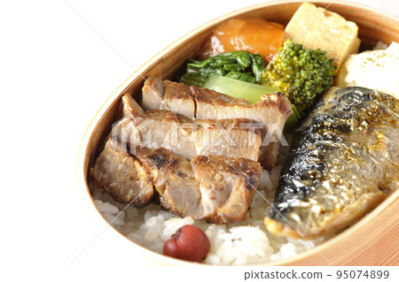 Grilled fish bento box with pork, potato salad, omelet, etc. Grilled fish bento box with pork, potato salad, omelet, etc. 95074899