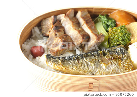 A grilled fish lunch box with pork, potato salad, omelet, etc. in a white background 95075260