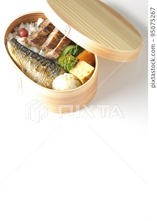 A grilled fish lunch box with pork, potato salad, omelet, etc. in a white background A grilled fish lunch box with pork, potato salad, omelet, etc. in a white background 95075267
