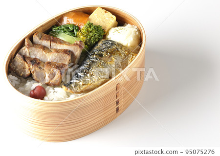 A grilled fish lunch box with pork, potato salad, omelet, etc. in a white background A grilled fish lunch box with pork, potato salad, omelet, etc. in a white background 95075276