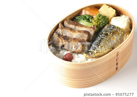 A grilled fish lunch box with pork, potato salad, omelet, etc. in a white background A grilled fish lunch box with pork, potato salad, omelet, etc. in a white background 95075277