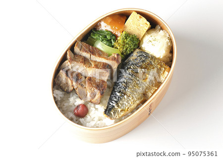 A bird's-eye view of a grilled fish bento box containing pork, potato salad, omelet, etc. in a white background A bird's-eye view of a grilled fish bento box containing pork, potato salad, omelet, etc. in a white background 95075361