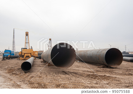 The large pipes at construction site 95075588