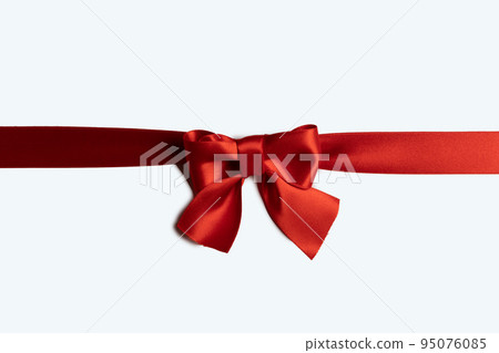 Red ribbon bow isolated on white Red ribbon bow isolated on white 95076085