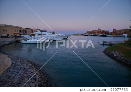 Abu Tig Marina in El Gouna, Hurghada, Red Sea Governorate, Egypt sunset view showing luxury yachts. Abu Tig Marina in El Gouna, Hurghada, Red Sea Governorate, Egypt sunset view showing luxury yachts. 95077783