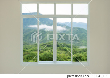 Modern house window view with mountain background 95081033