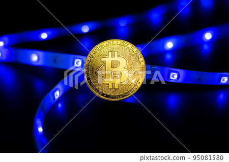 Cryptocurrency concept , Golden bitcoin on mainboard , The future of money. Computational equipment. 95081580