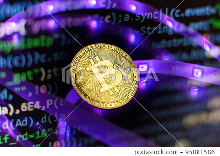 Cryptocurrency concept , Golden bitcoin on mainboard , The future of money. Computational equipment. 95081586
