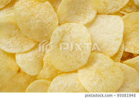 crispy potato chips snack texture background top view 95081948